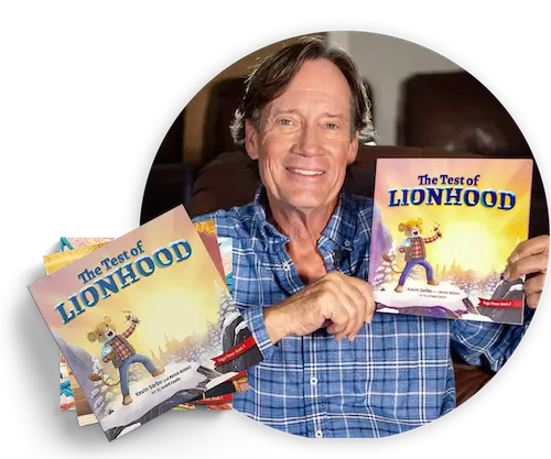 Kevin Sorbo flexing with his Children's book, The Test of Lionhood