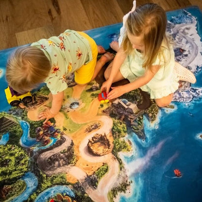 Children playing on the Freedom Island Playmat from Brave Books