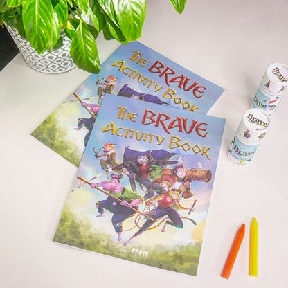 BRAVE Activity Book on a table with BRAVE Crayons