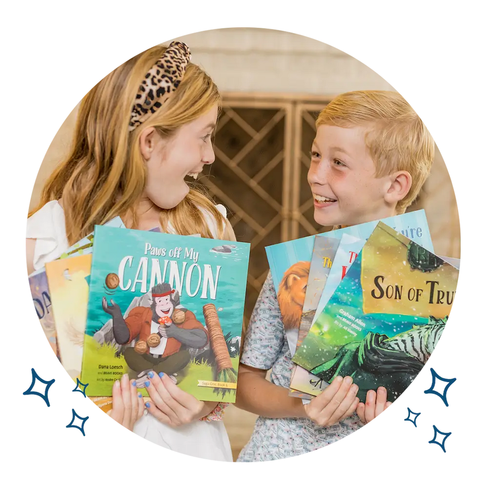 A little boy and girl holding up BRAVE books smiling