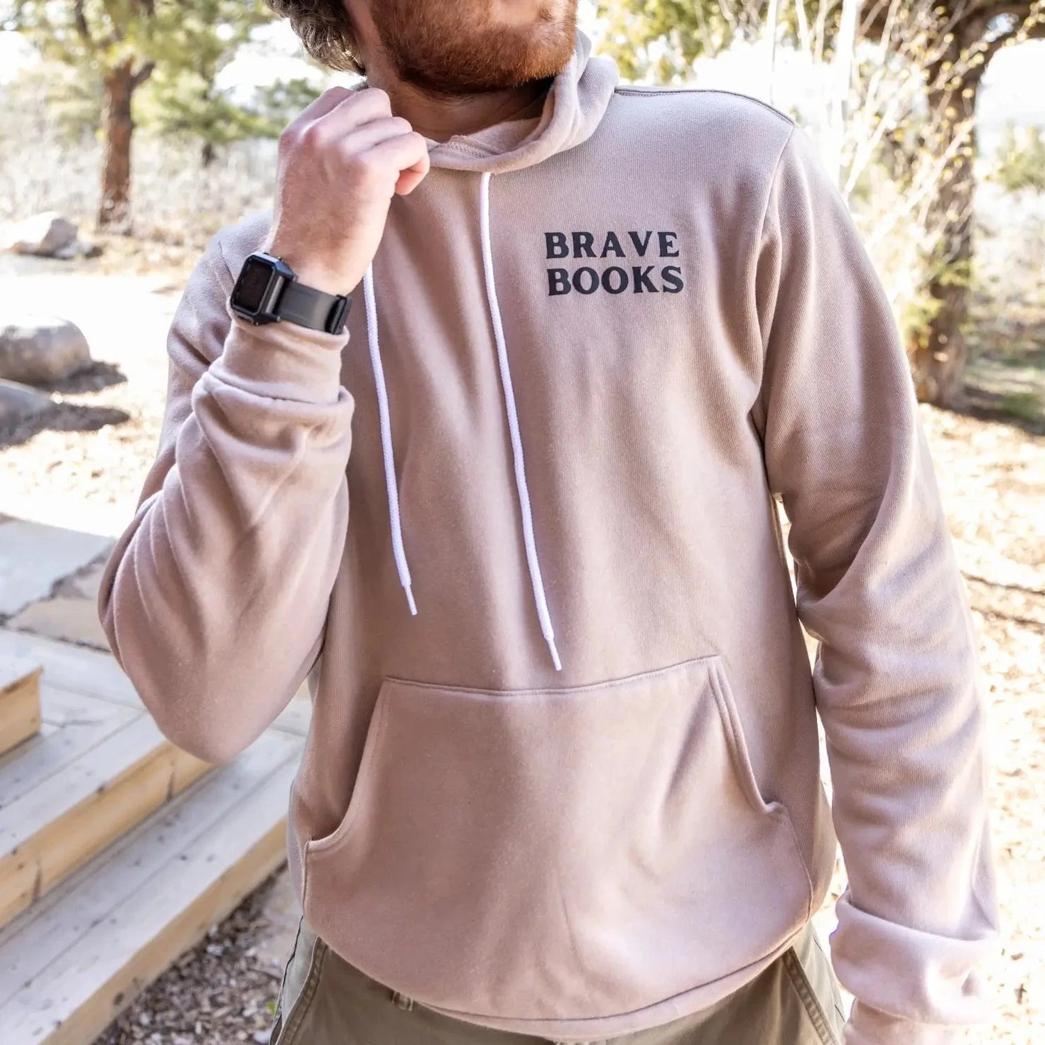 Man wearing BRAVE Books pro-god, pro-America hoodie